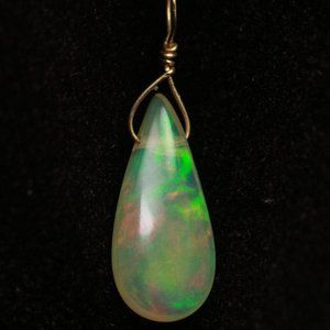 Ethiopian opal tear drop 14k gold pendant